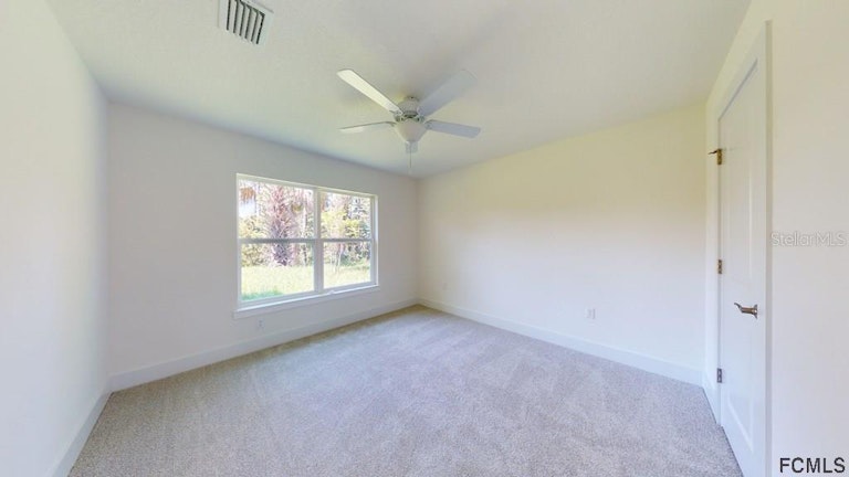 Photo 16 of 35 - 12 Pittman Dr, Palm Coast, FL 32164