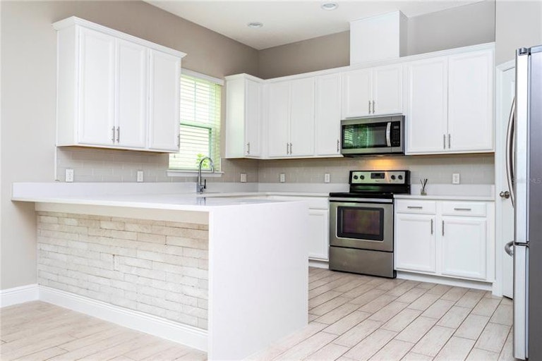 Photo 9 of 65 - 9313 Mira Valle Ln, Winter Garden, FL 34787