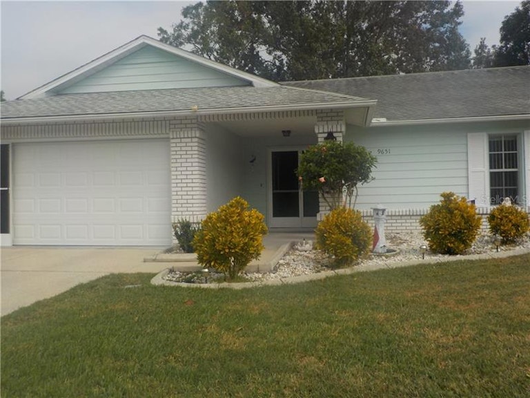 Photo 1 of 13 - 9651 Cavendish Ct, New Port Richey, FL 34655
