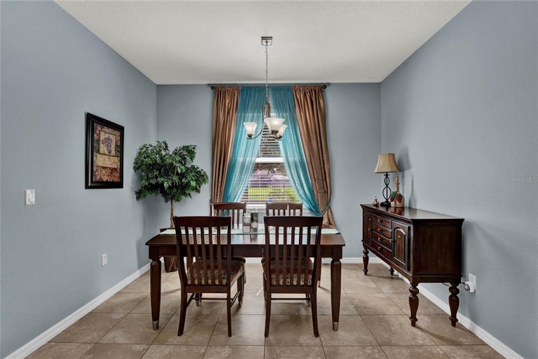 Photo 5 of 36 - 1033 Wood Cv, Kissimmee, FL 34743