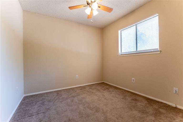 Photo 15 of 32 - 9000 Mountain Ridge Dr, Austin, TX 78759