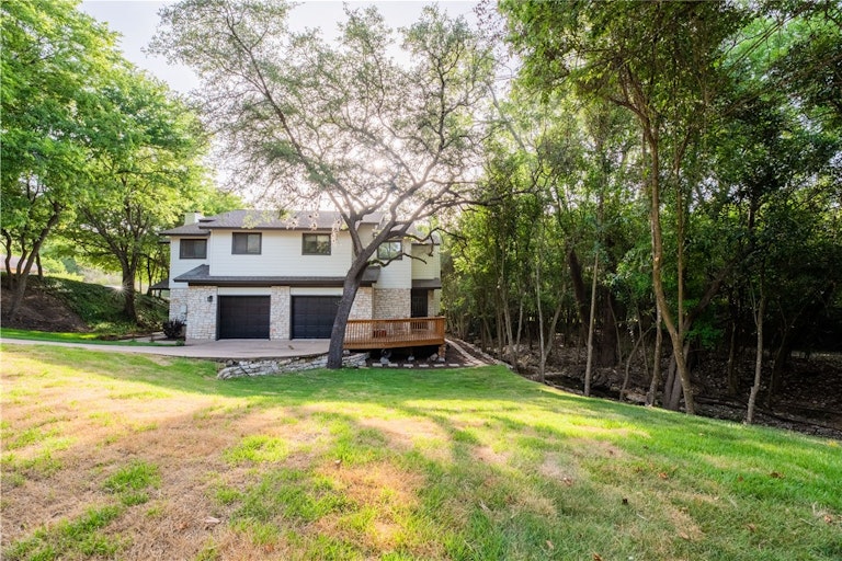 Photo 22 of 32 - 9000 Mountain Ridge Dr, Austin, TX 78759