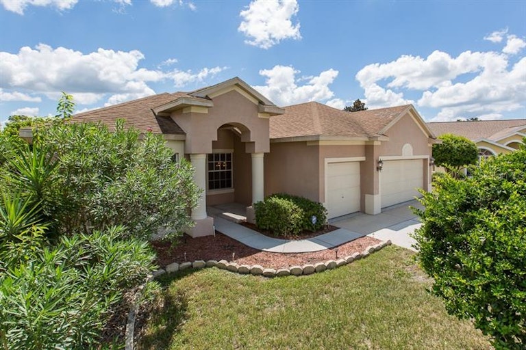 Photo 1 of 25 - 9118 Flagstick Ln, Hudson, FL 34667
