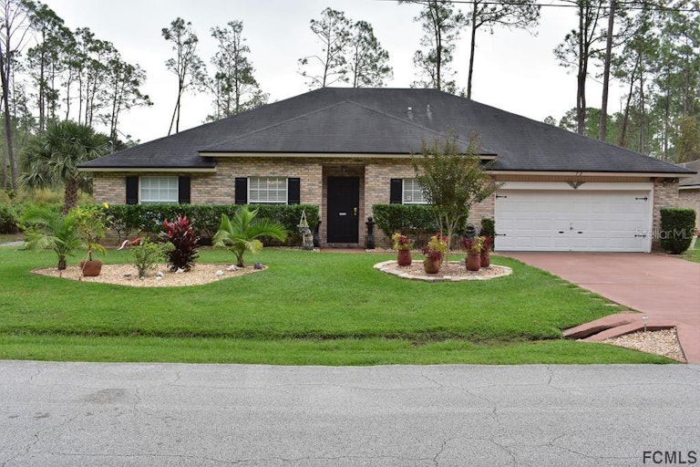 Photo 1 of 35 - 72 Red Mill Dr, Palm Coast, FL 32164