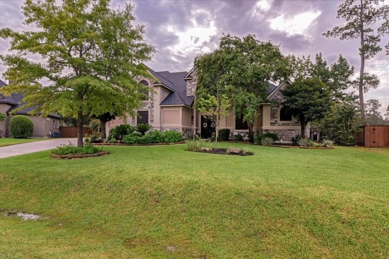 Photo 2 of 50 - 25306 Fawn Point Ct, Spring, TX 77389