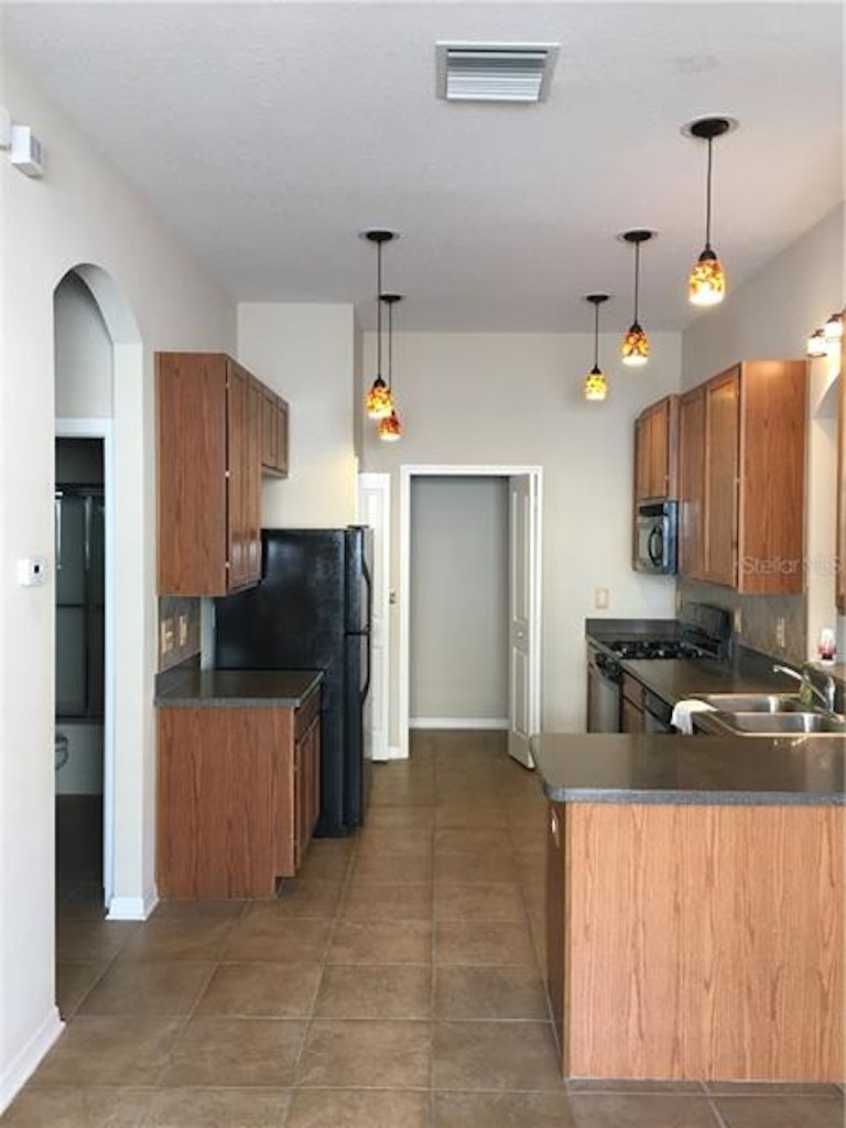 Photo 3 of 25 - 1115 Wrightswynde Ct, Wesley Chapel, FL 33543