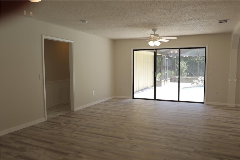 Photo 2 of 19 - 8321 Philadelphia Ave, Spring Hill, FL 34608