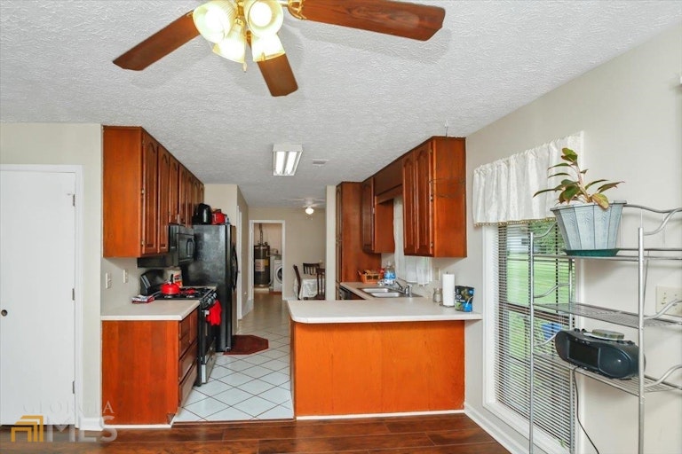 Photo 11 of 22 - 11525 Matthews Trl, Hampton, GA 30228