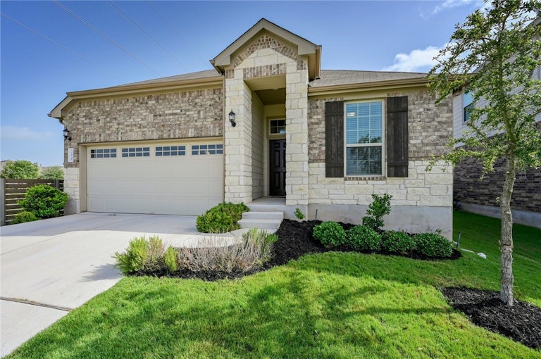 Photo 3 of 23 - 210 Quarryman Dr, Hutto, TX 78634