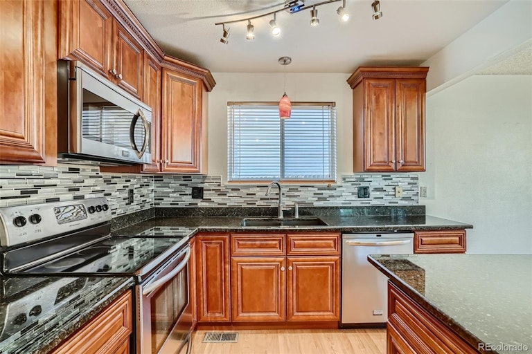 Photo 9 of 28 - 12211 Niagara Ct, Brighton, CO 80602