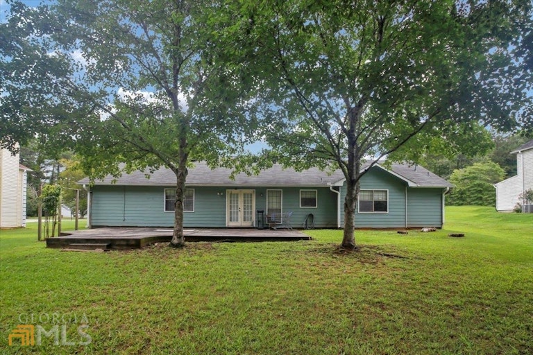 Photo 4 of 22 - 11525 Matthews Trl, Hampton, GA 30228