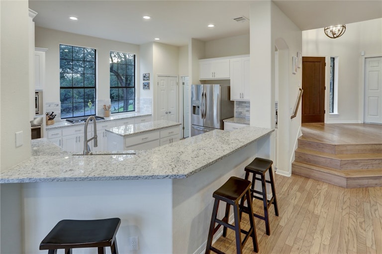 Photo 12 of 40 - 6301 Mountainclimb Dr, Austin, TX 78731