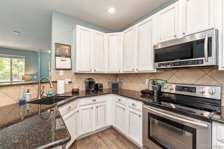 Photo 9 of 19 - 11287 Osage Cir Unit E, Northglenn, CO 80234