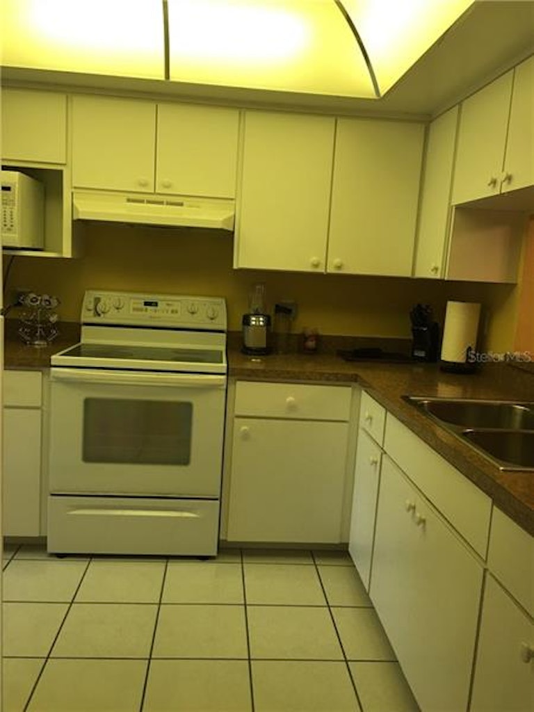 Photo 5 of 12 - 5157 Silent Loop #214, New Port Richey, FL 34652