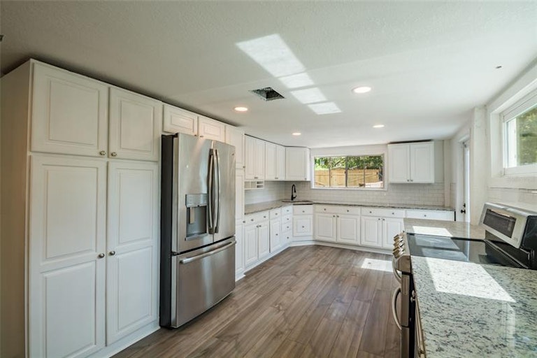 Photo 9 of 37 - 7230 Plathe Rd, New Port Richey, FL 34653