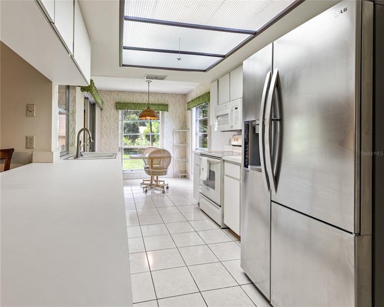 Photo 13 of 65 - 6144 Muirfield Ct, Spring Hill, FL 34606