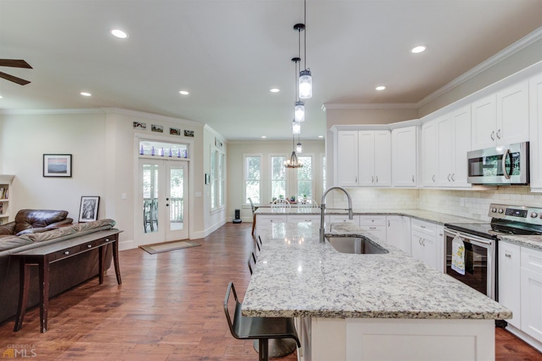 Photo 14 of 51 - 477 Tom Smith Rd SW, Lilburn, GA 30047