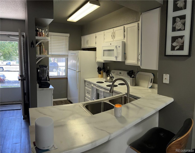 Photo 7 of 24 - 12085 E Tennessee Ave, Aurora, CO 80012