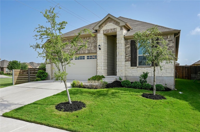 Photo 2 of 23 - 210 Quarryman Dr, Hutto, TX 78634