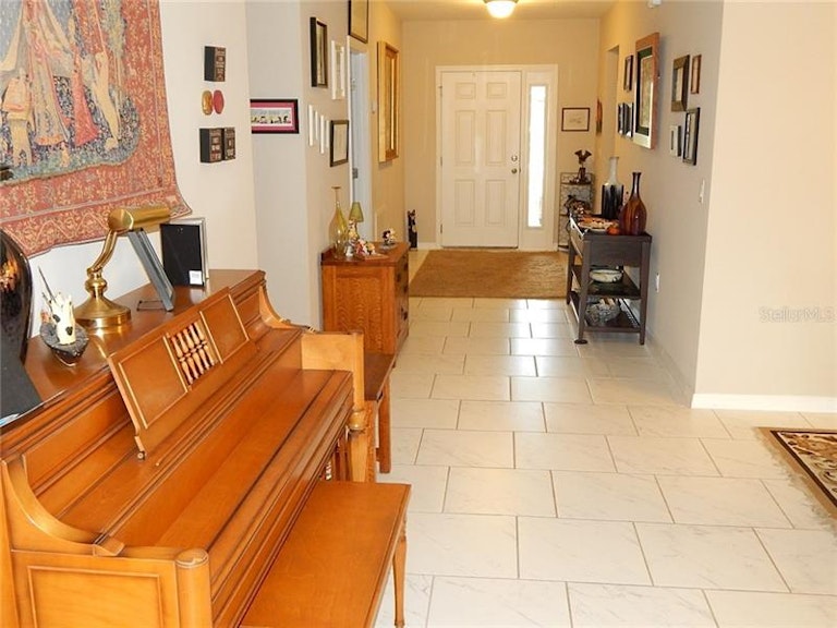 Photo 8 of 24 - 4979 Grassy Knoll Dr, Tavares, FL 32778