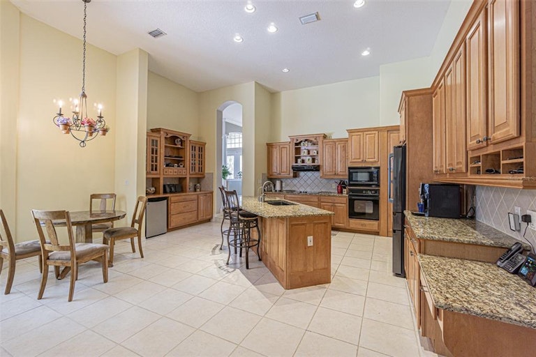 Photo 12 of 36 - 1462 Kensington Woods Dr, Lutz, FL 33549