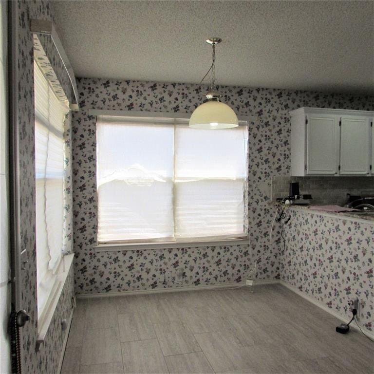 Photo 13 of 32 - 1345 Mill Wood Ln, Garland, TX 75040