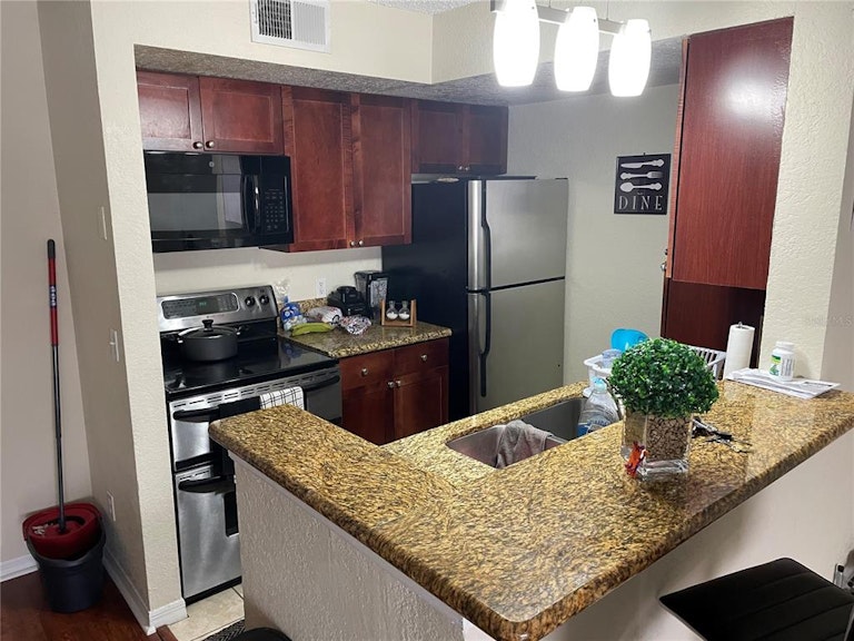 Photo 15 of 44 - 5168 Conroy Rd #25, Orlando, FL 32811
