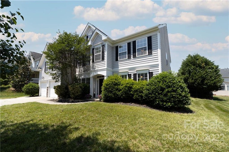 Photo 2 of 32 - 7808 Whisperingwood Dr, Harrisburg, NC 28075