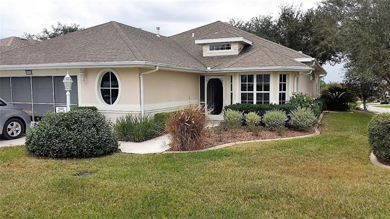 Photo 1 of 25 - 21213 Braveheart Dr, Leesburg, FL 34748