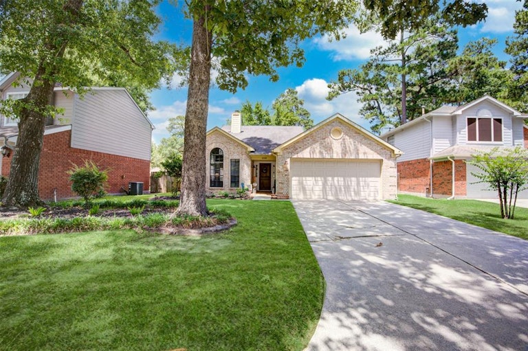 Photo 2 of 48 - 4918 Dobbin Springs Ln, Kingwood, TX 77345