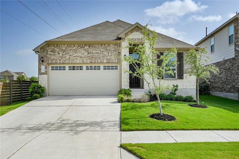 Photo 1 of 23 - 210 Quarryman Dr, Hutto, TX 78634