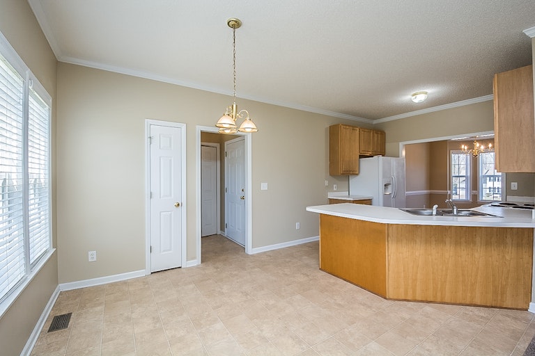 Photo 4 of 23 - 1208 Sunswept Cir, Raleigh, NC 27603