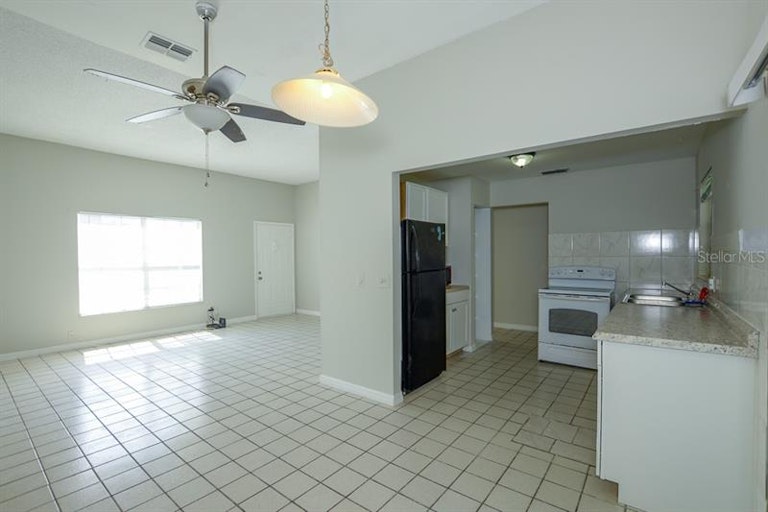 Photo 12 of 39 - 604 Deauville Ct, Kissimmee, FL 34758