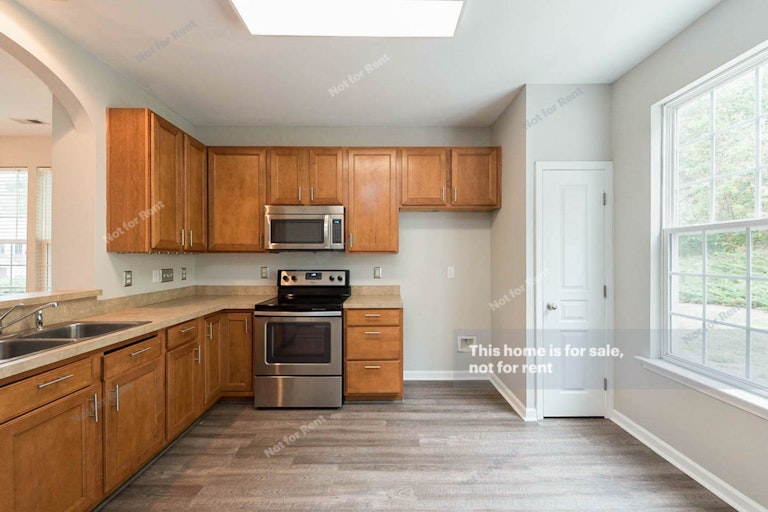 Photo 2 of 14 - 7631 Satinwing Ln, Raleigh, NC 27617