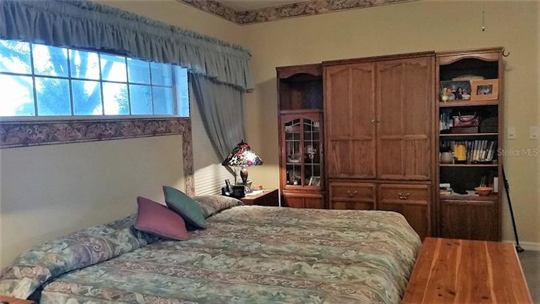 Photo 14 of 25 - 21213 Braveheart Dr, Leesburg, FL 34748