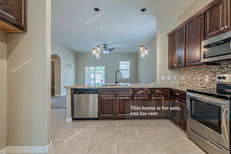 Photo 8 of 17 - 9859 N Howling Wolf Rd, Marana, AZ 85653